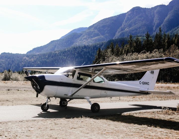 Bush plane on a dirt airstrip