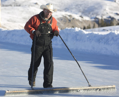 A photo of a man clearing the ice | Stanley Chamber