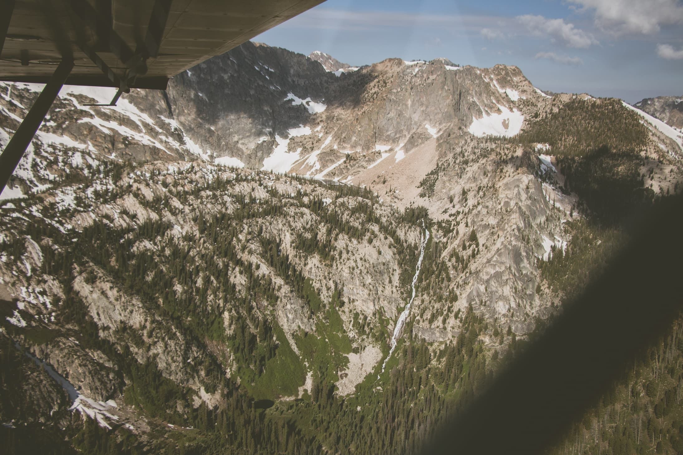Beautiful view of the mountains from the plane in Stanley, ID | Stanley Chambers