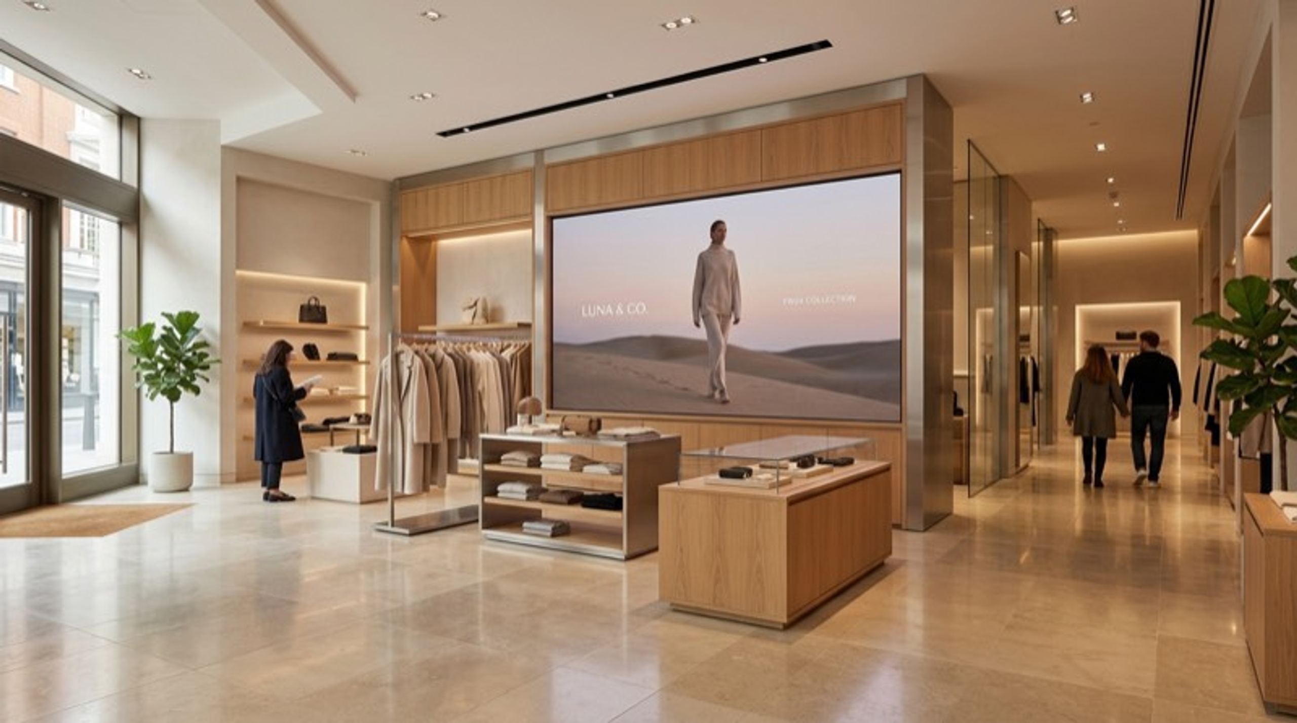 Large indoor LED video wall showing calm brand imagery in a premium retail store interior
