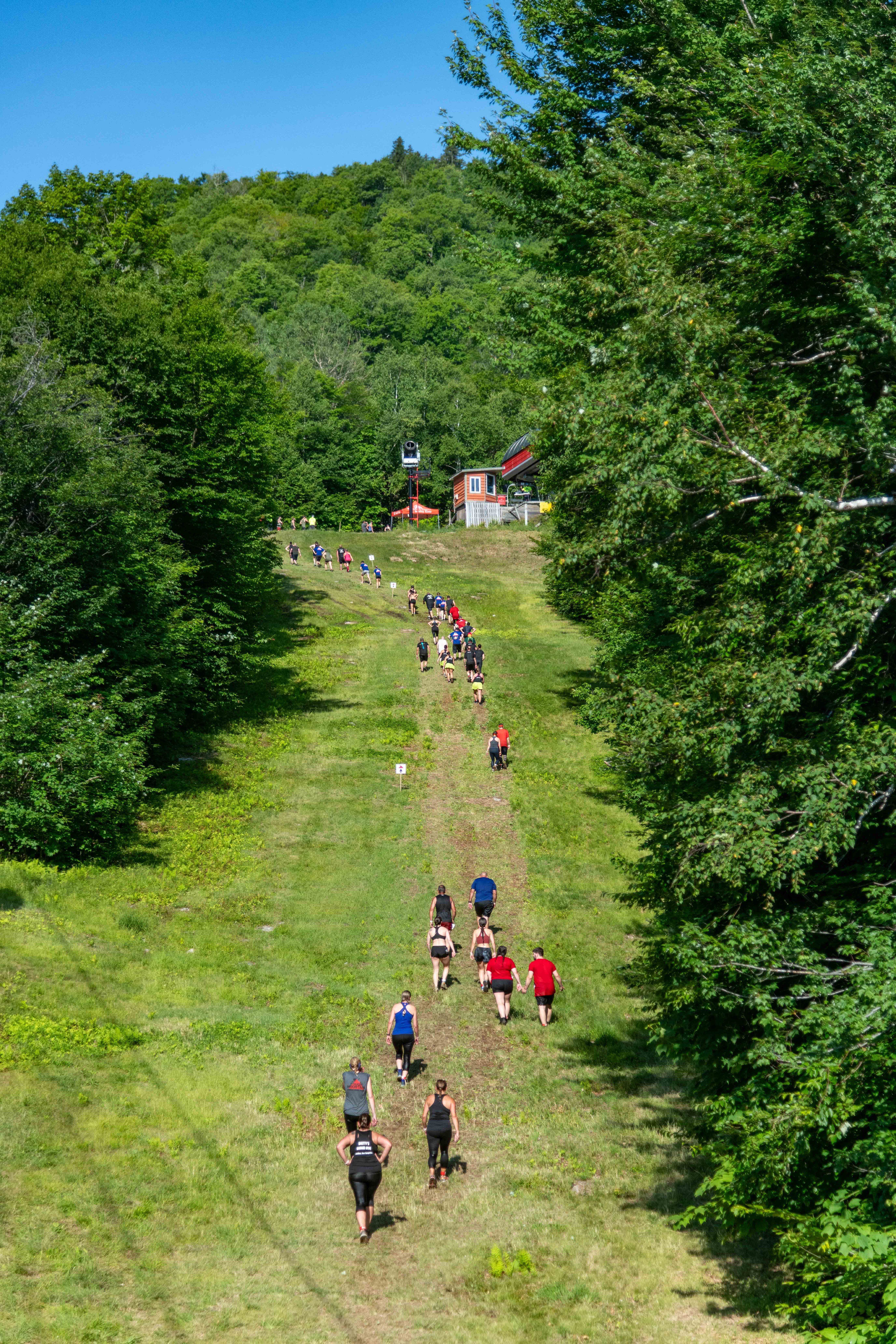 People running up the hill for Tough Mountain Challenge.