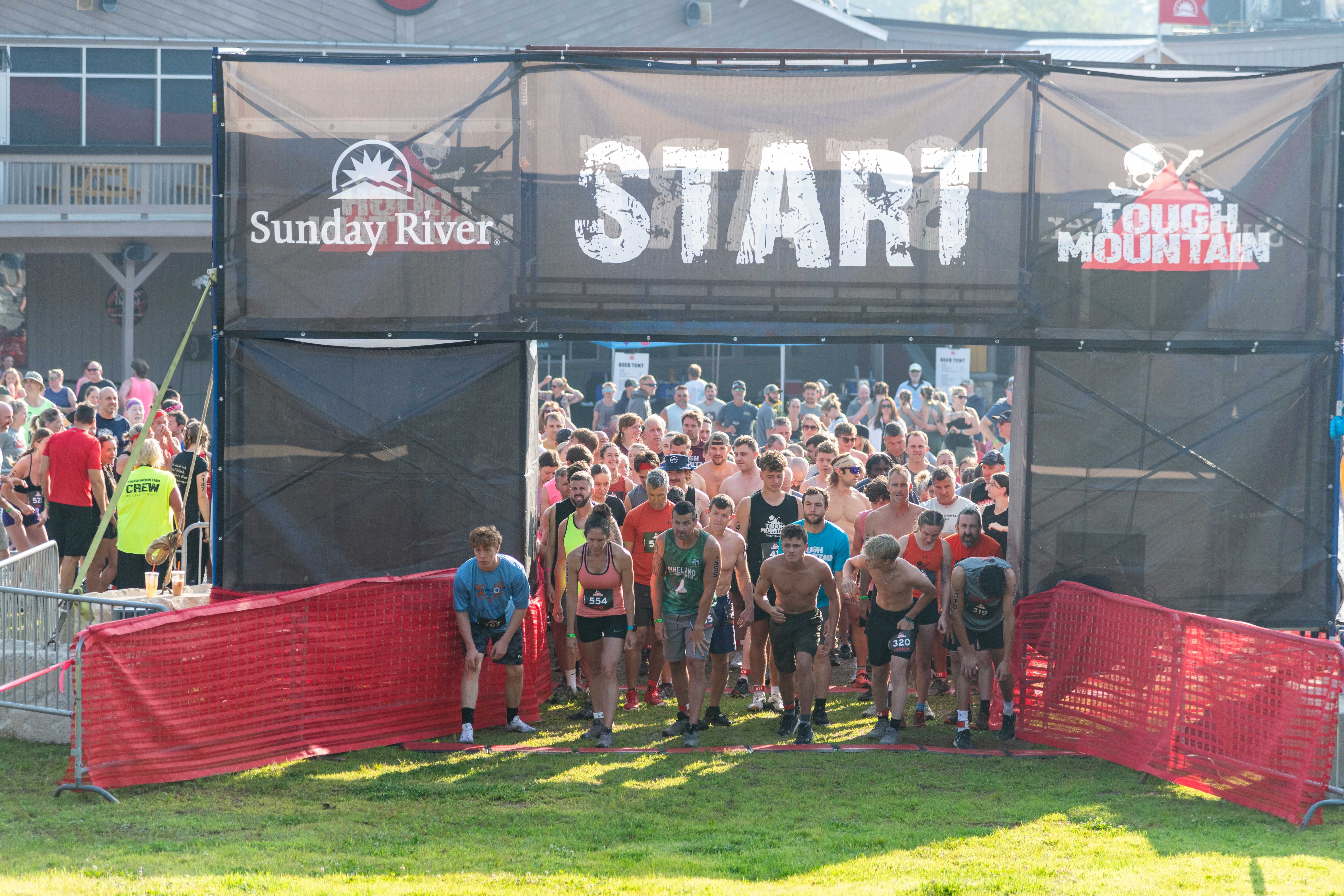 A heat of Tough Mountain Challenge running out of the start.