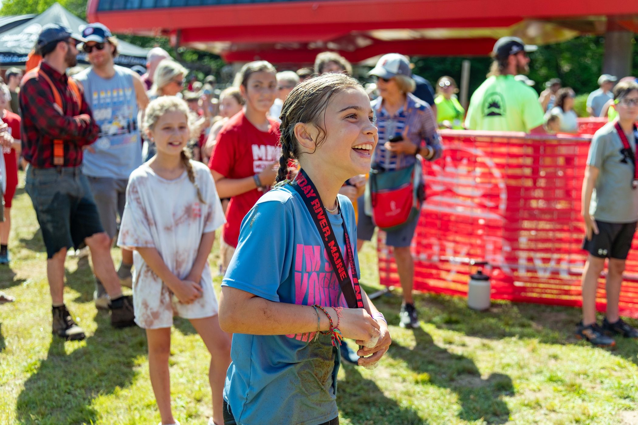 Mini Mountain Challenge competitor receiving his medal.