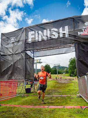 Competitor crossing the finish line.
