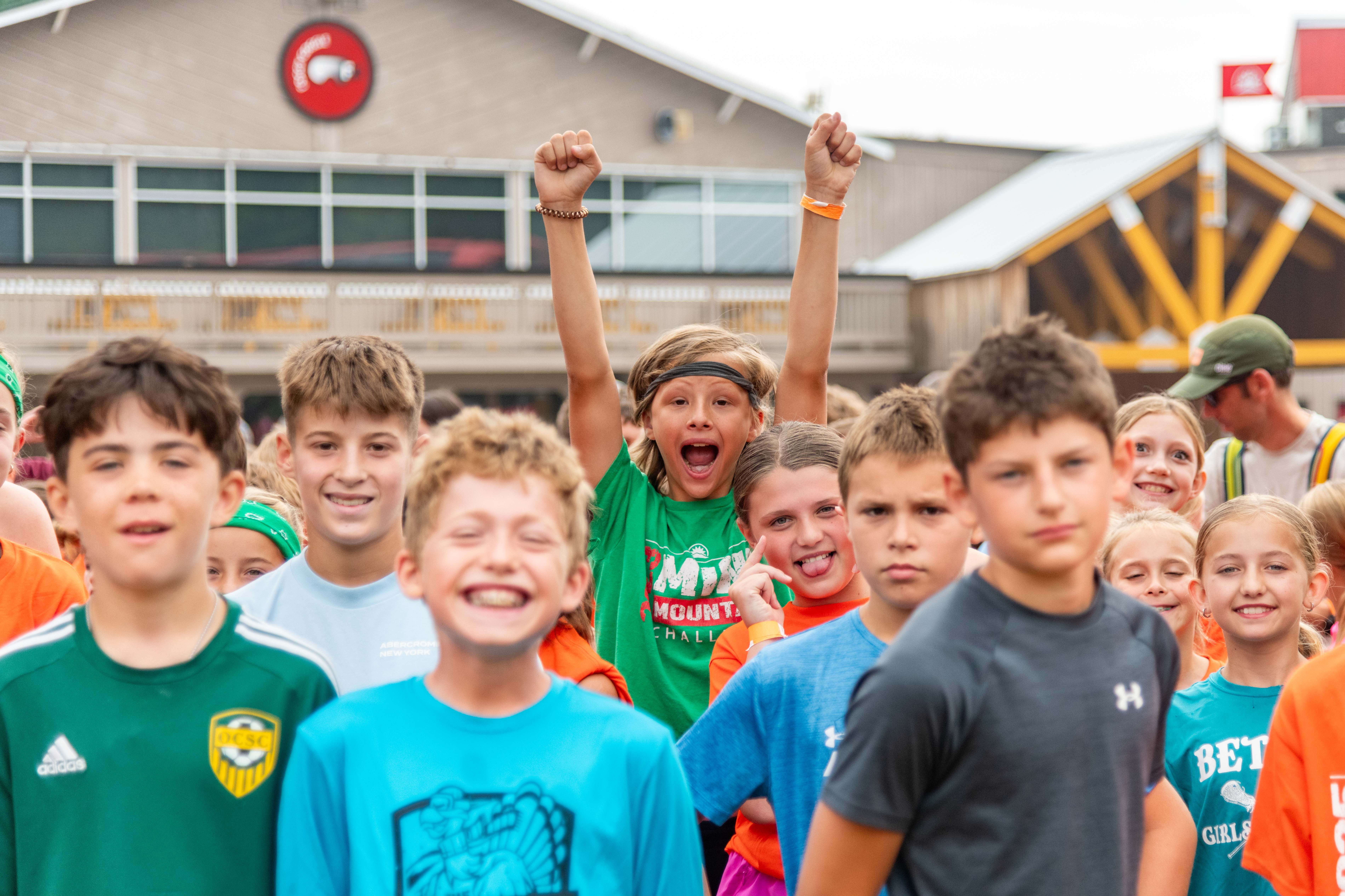 Mini Mountain competitors smiling at the start area.