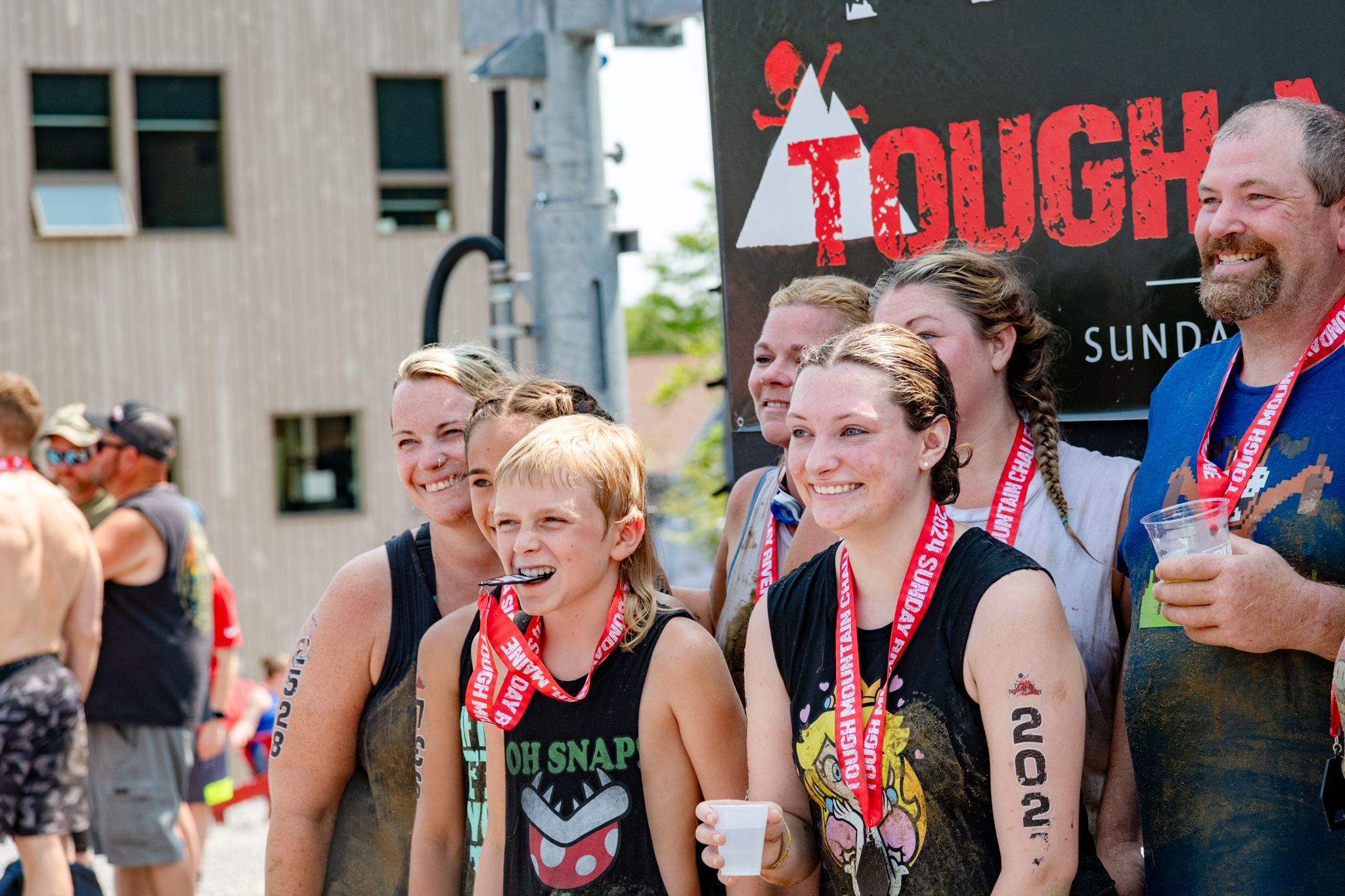 A group of athletes finishing the line of the Tough Mountain Challenge