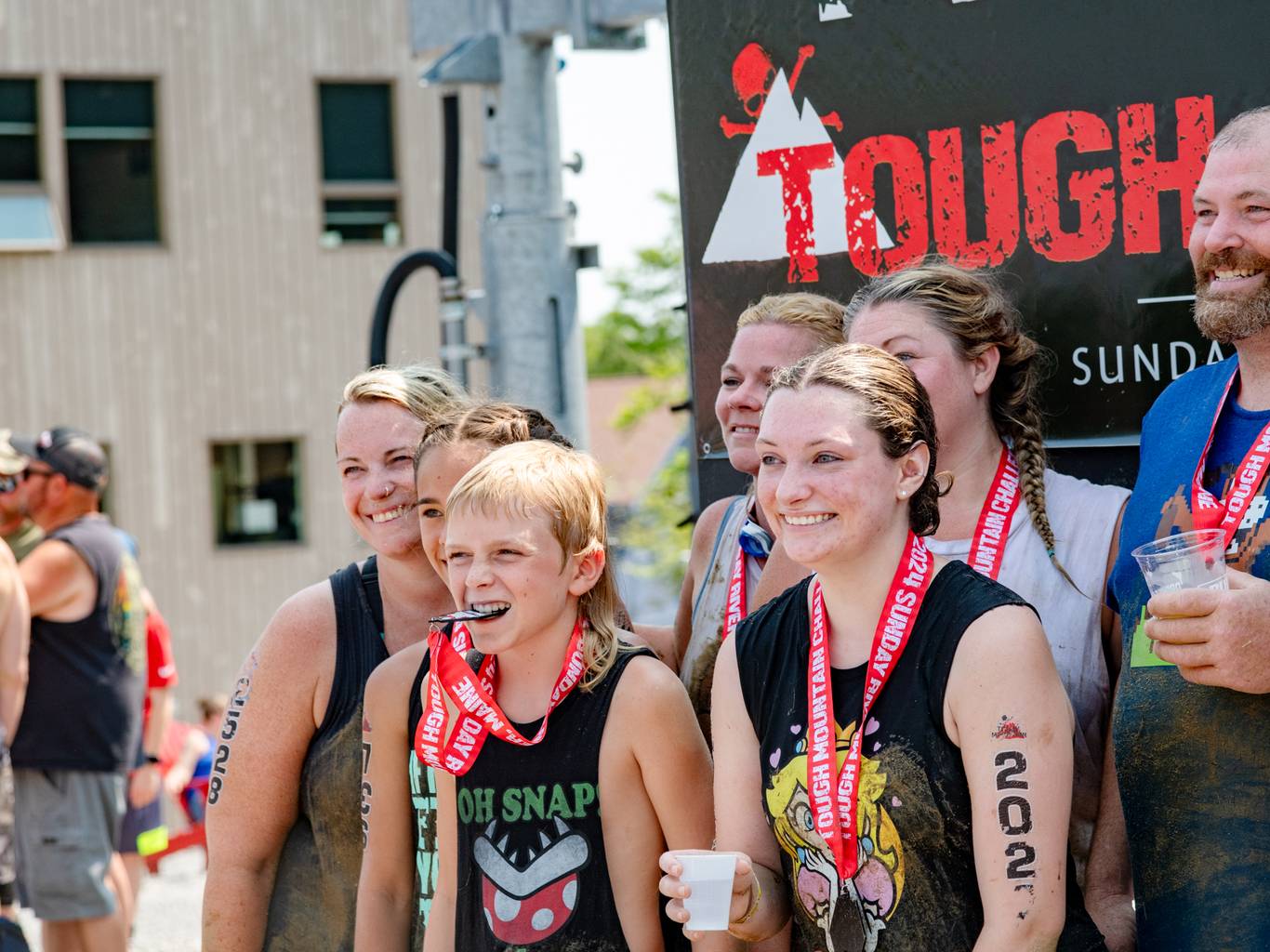 A group of athletes finishing the line of the Tough Mountain Challenge