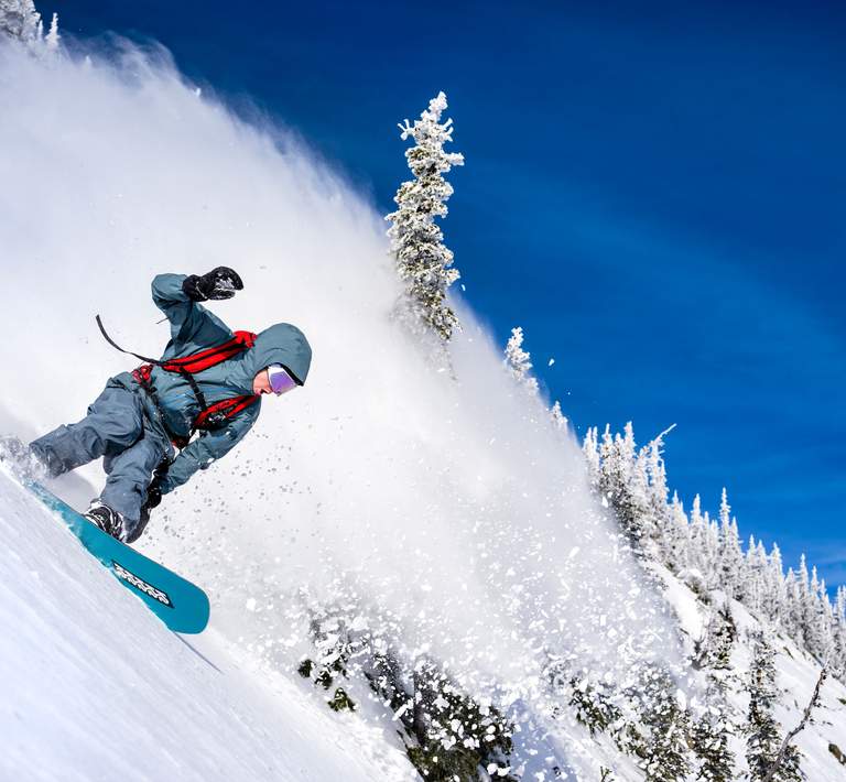 Skier in powder at Crystal