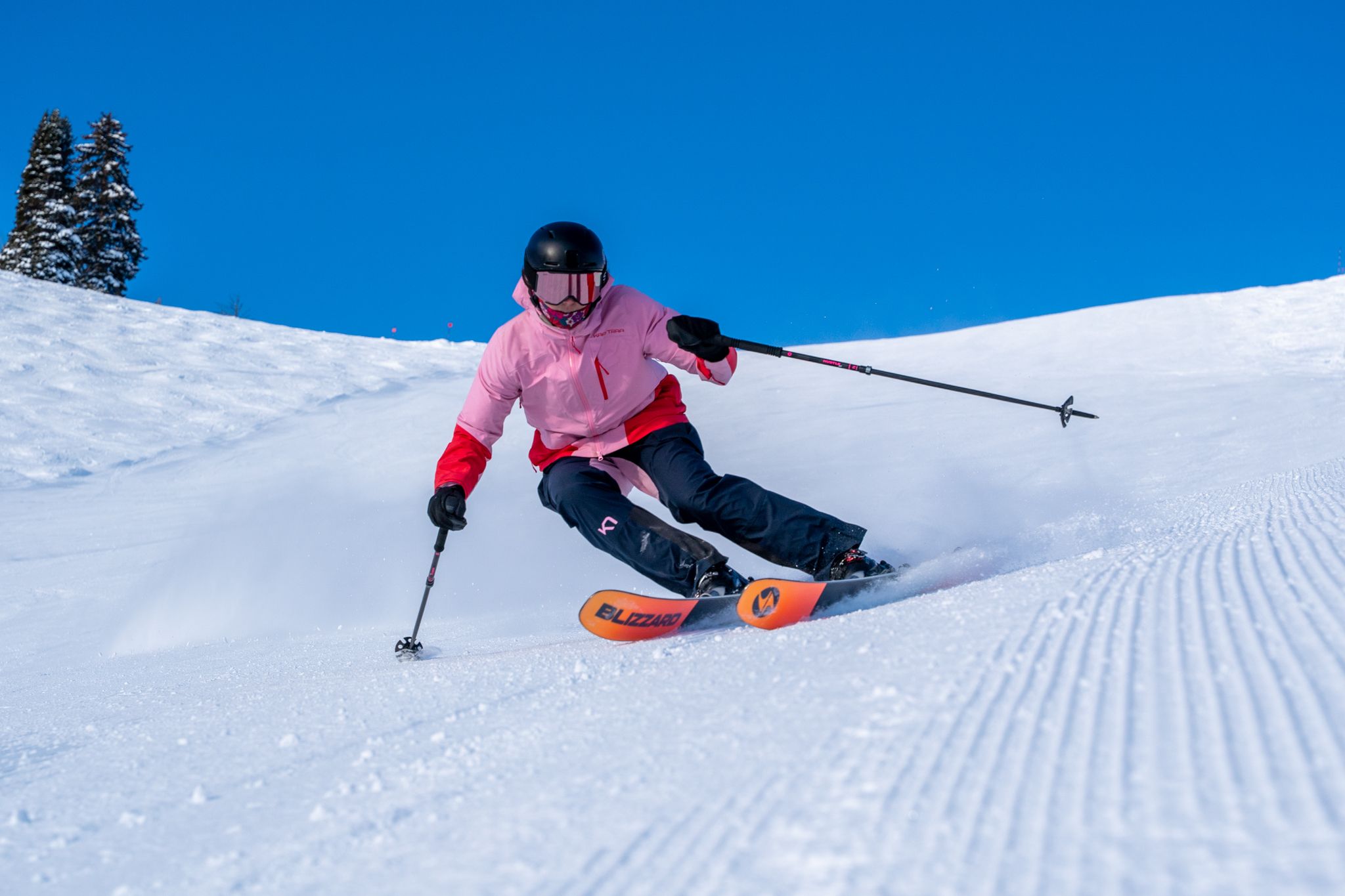 Skier enjoying deep powder in Honeycomb Canyon on a bluebird midweek day