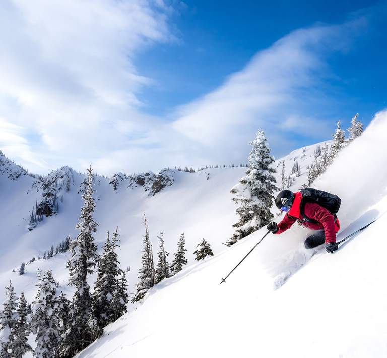 Skier with Mt Rainier Gondola at Crystal