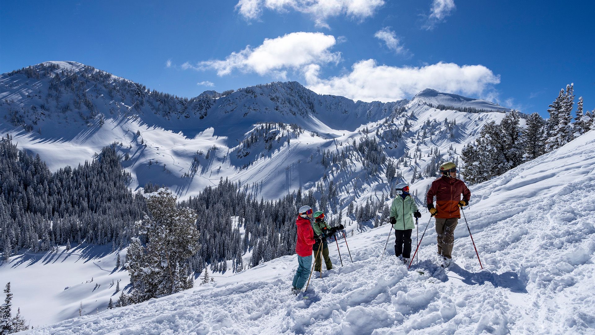 Family enjoying a bluebird day at Solitude Mountain Resort