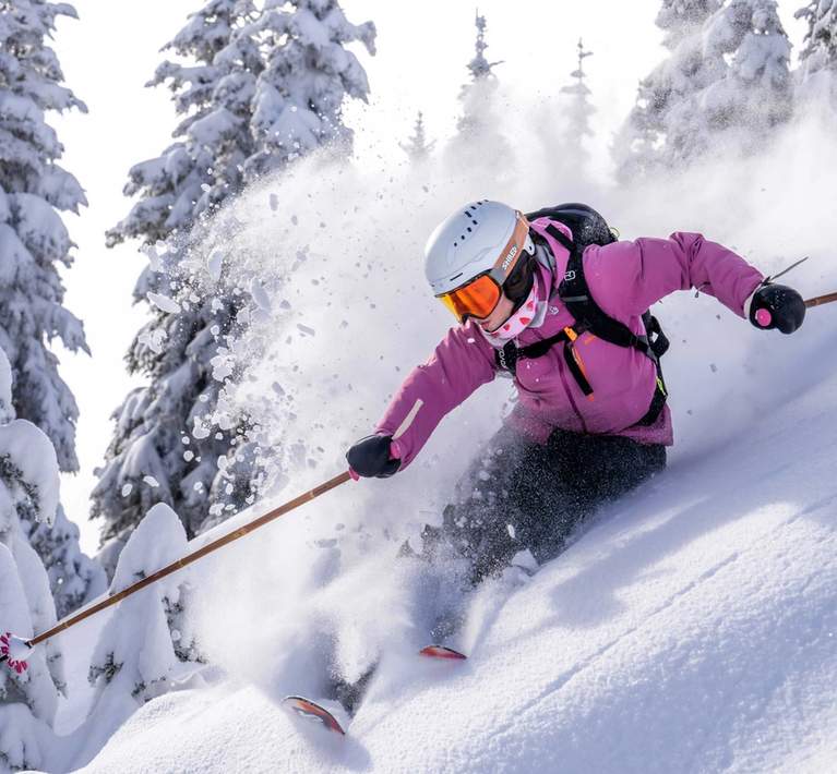Skier in powder at Crystal