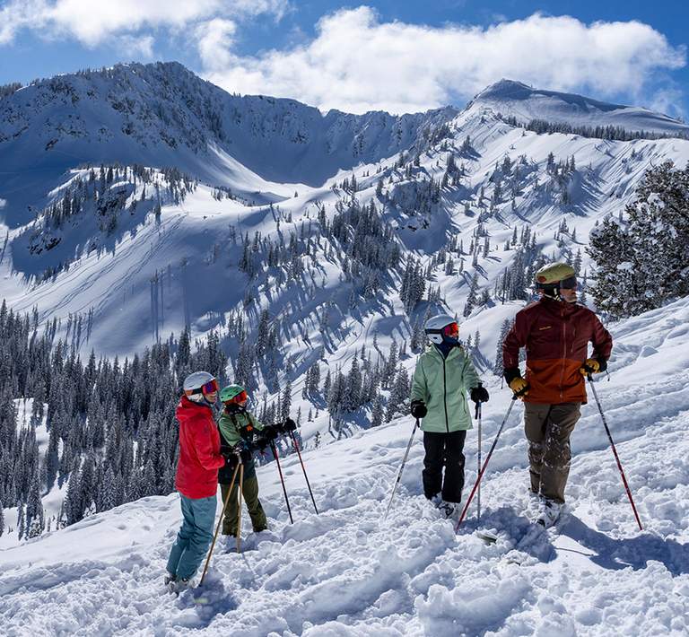 Family enjoying a bluebird day at Solitude Mountain Resort