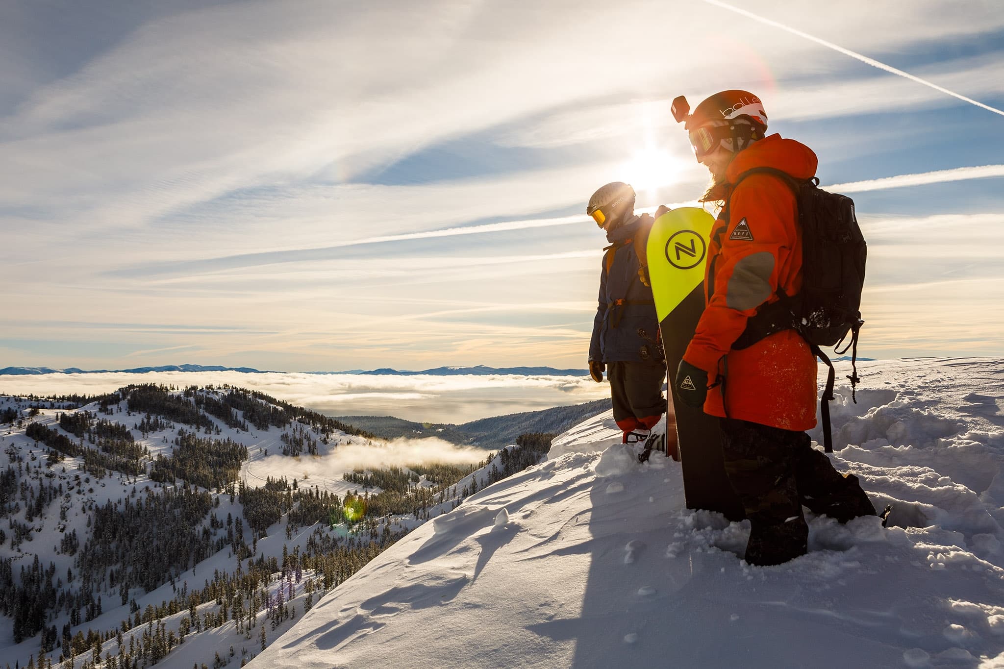 Skier on a Neon Colored outfit carving downhill