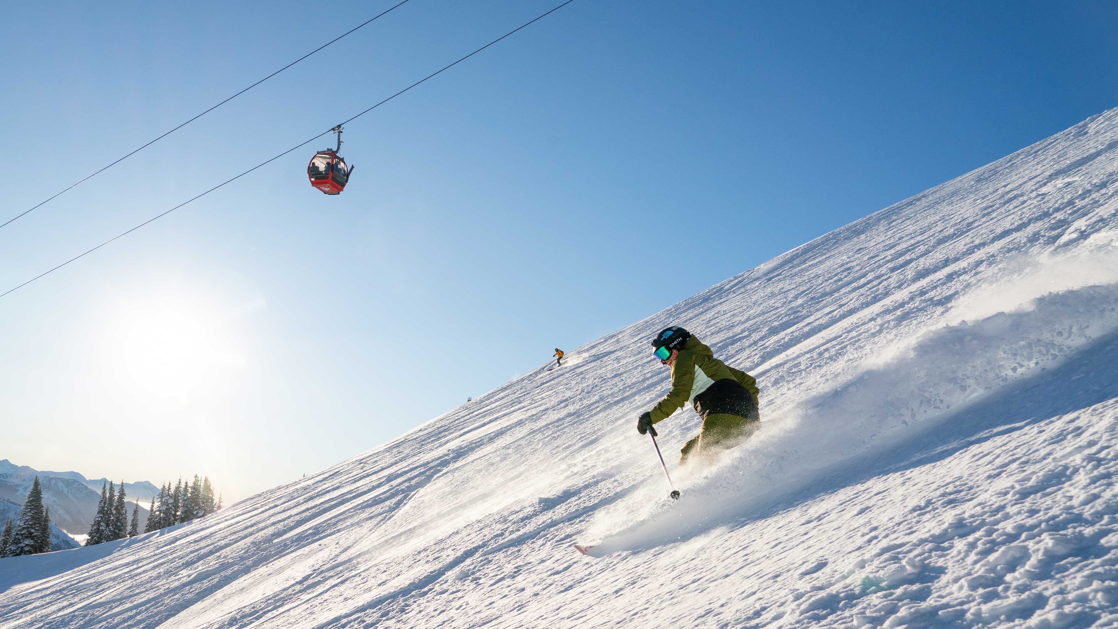 Skier with Mt Rainier Gondola at Crystal