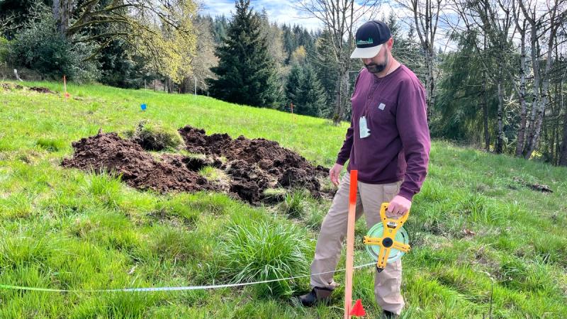 EGSD crew staking a drainfield at a job site