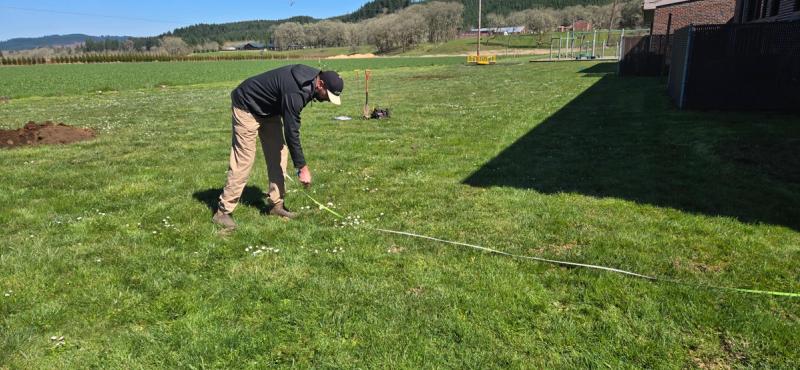 Measuring property setbacks for a septic system installation
