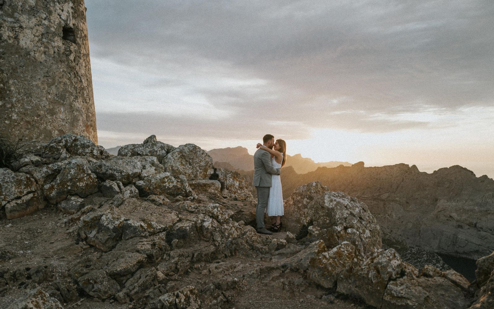 Couple at sunset in the mountains of Mallorca