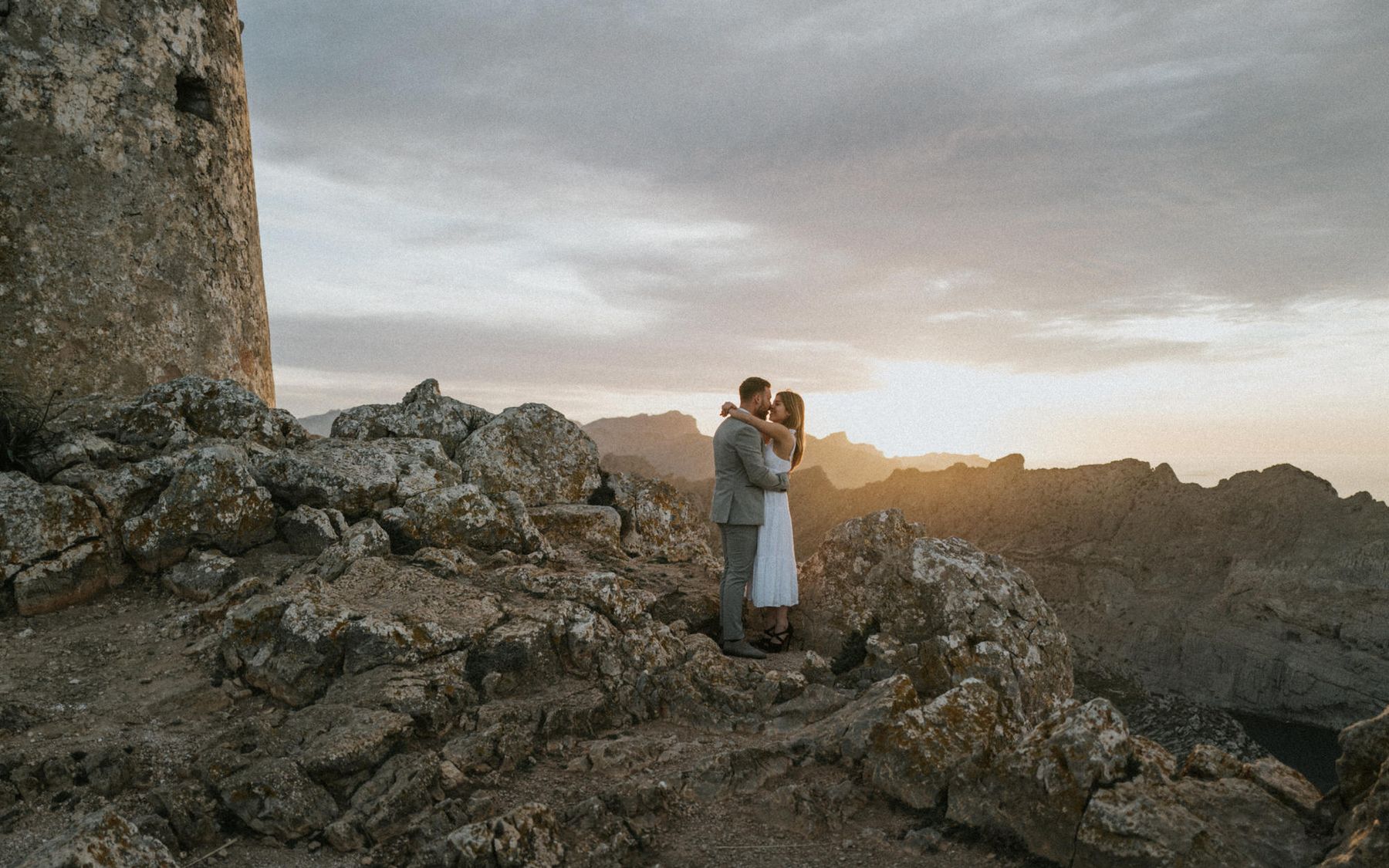 Couple at sunset in the mountains of Mallorca