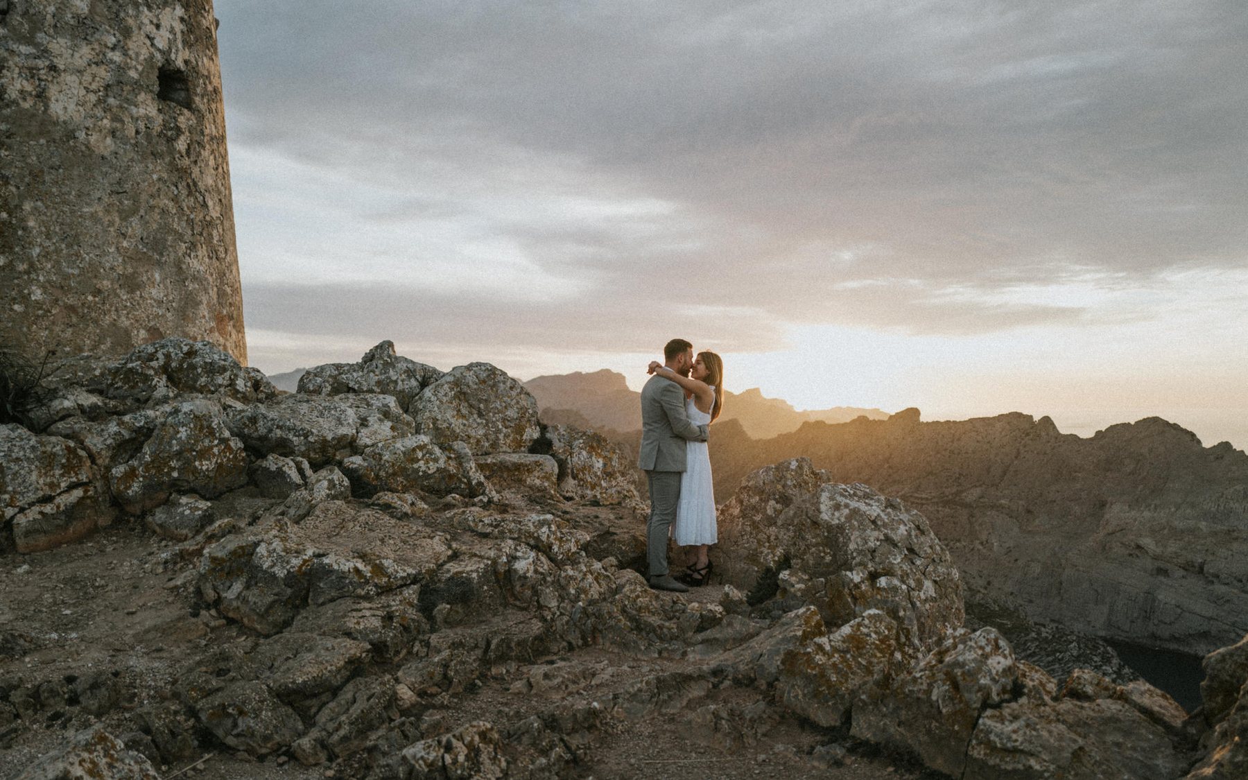 Couple at sunset in the mountains of Mallorca