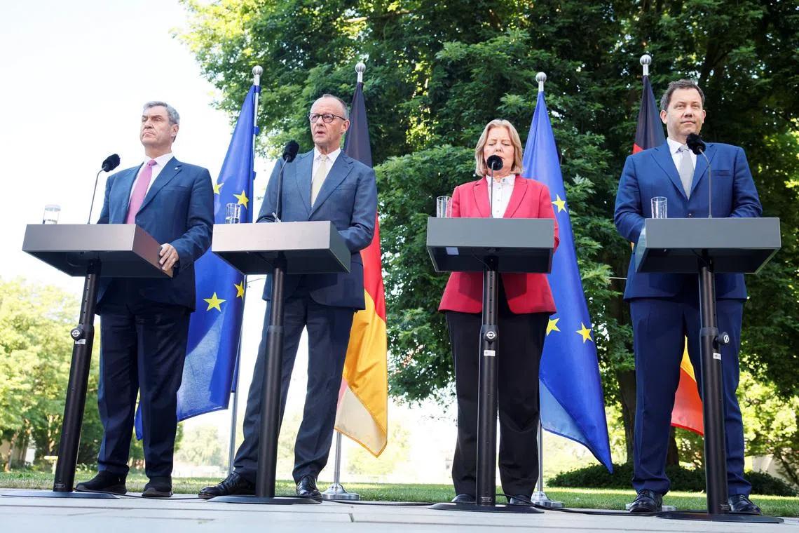 Germany's Coalition Unveils Reforms Amid Economic Strain and Far-Right Surge