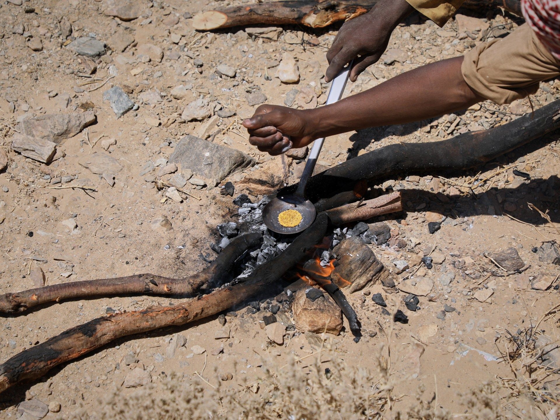 Gold Dust and Airstrikes: Miners Caught in a Border War