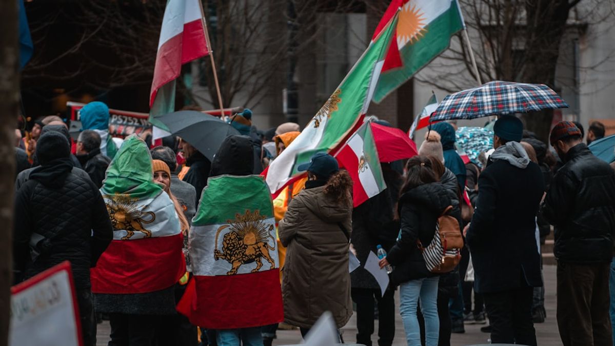 Iran War Tensions Escalate Amid Primaries and Mosque Shooting