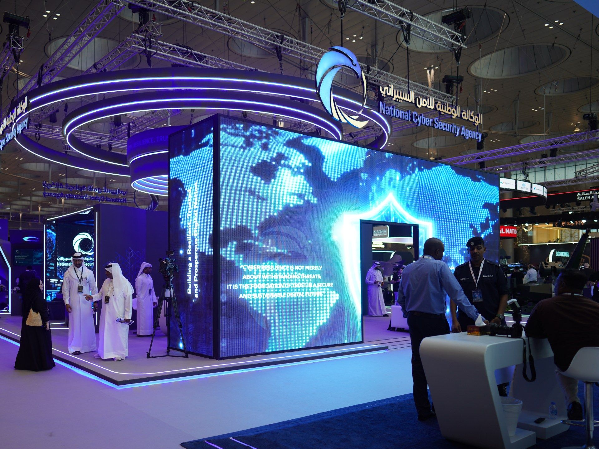 Robot Dogs, French Deals, and the Workers Behind Qatar's Security Show