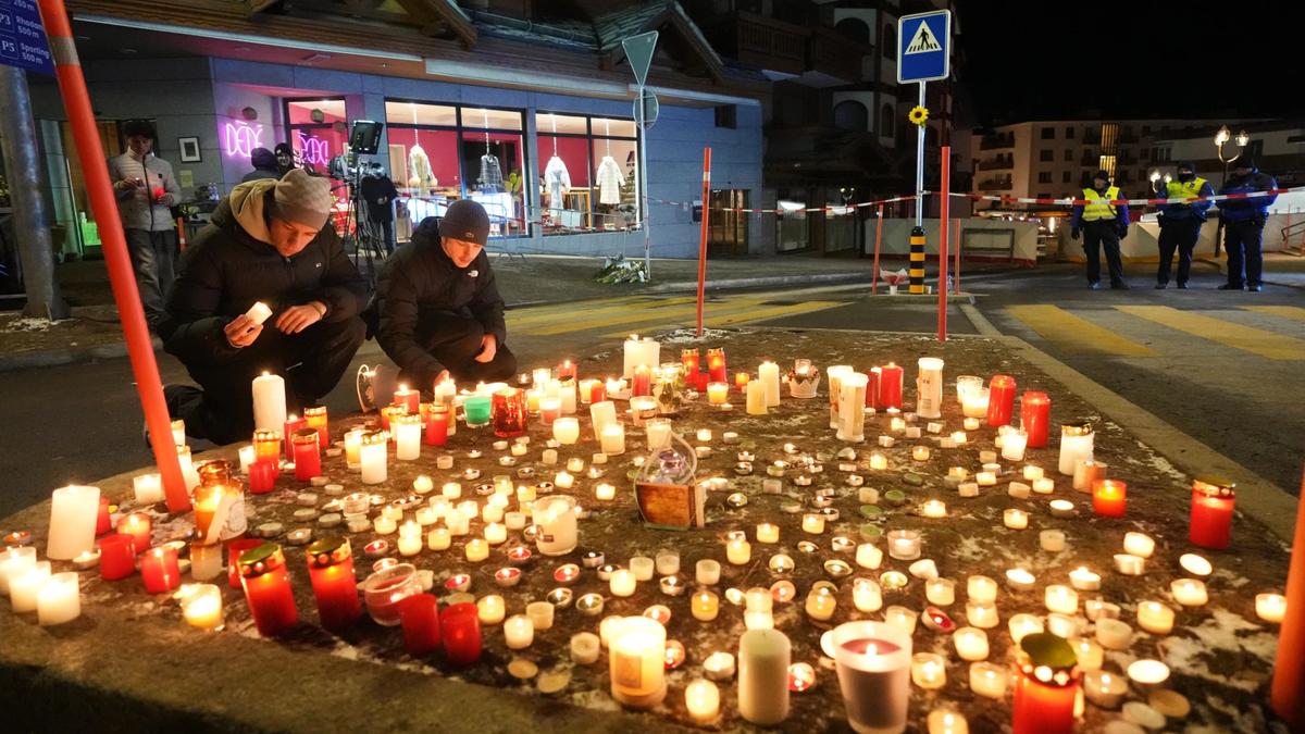 Swiss authorities detain co-owner of bar after deadly New Year’s Eve fire kills 40