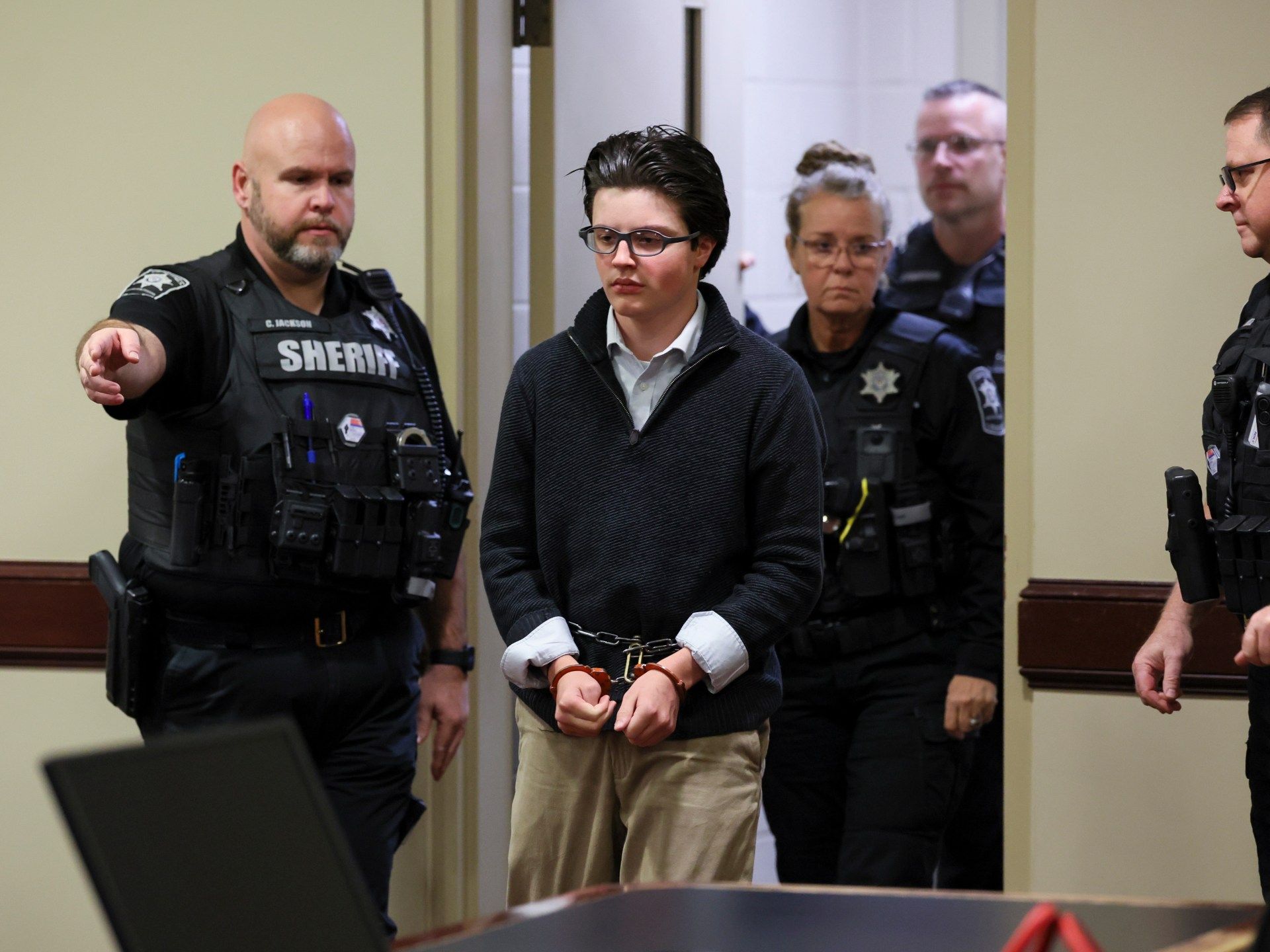 US School Shooting: Guilty Plea Exposes Parental Role in Mass Violence