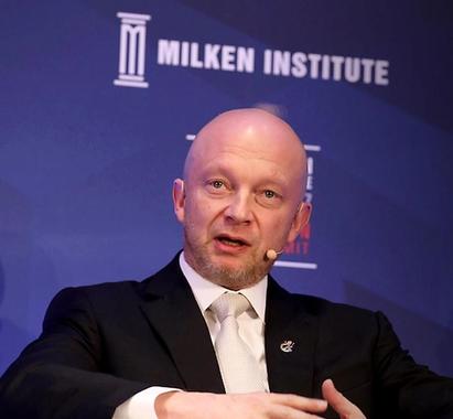Photo of Igor Tulchinsky speaking at Milken Institute London Summit