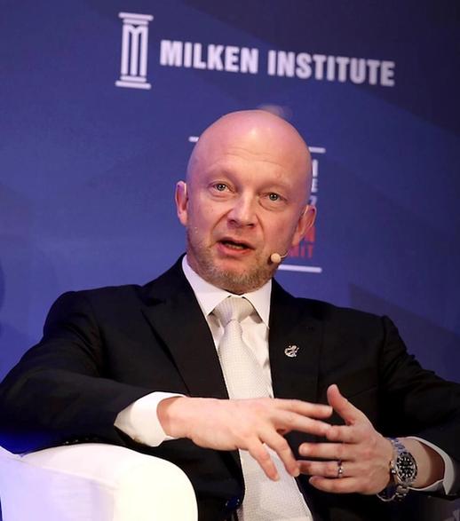 Photo of Igor Tulchinsky speaking at Milken Institute London Summit