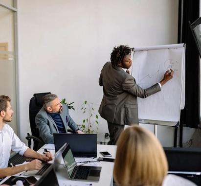 Financial engineer manager drawing on whiteboard