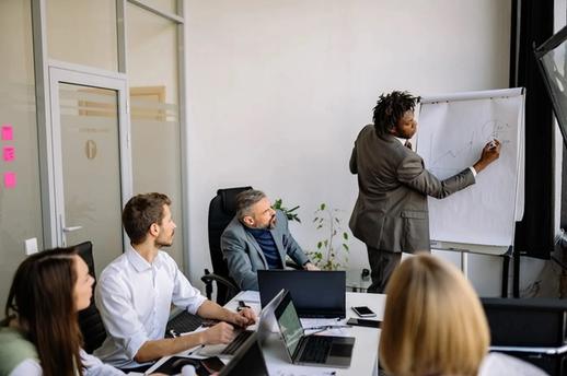 Financial engineer manager drawing on whiteboard