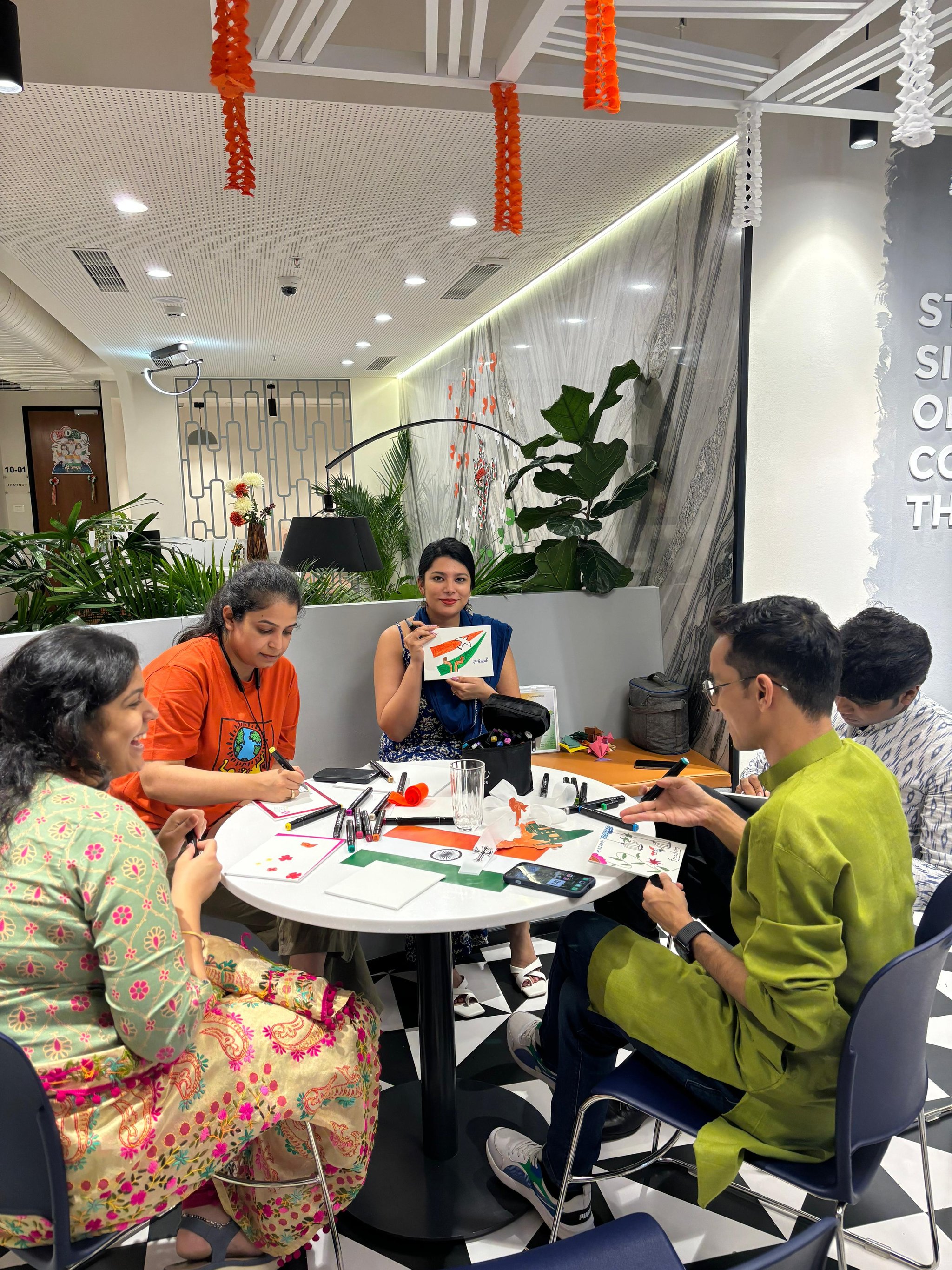 Employees enjoying a workspace café and breakout space