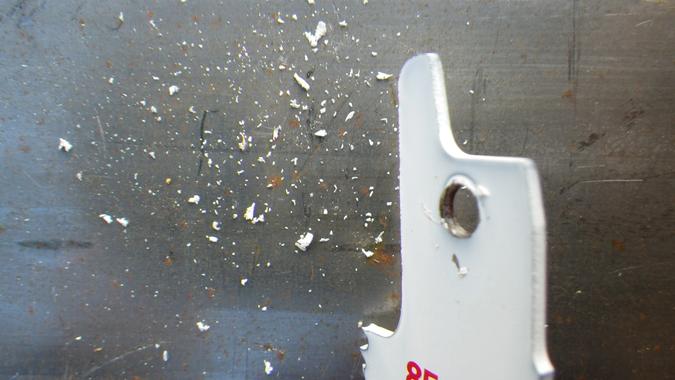 Saw blade after excess paint has been removed from the mounting hole