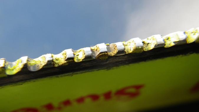 Close-up of a blade used with wide open throttle and improperly lubricated