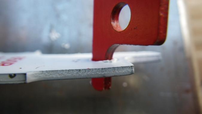 Cleaning out extra paint with the "tail"