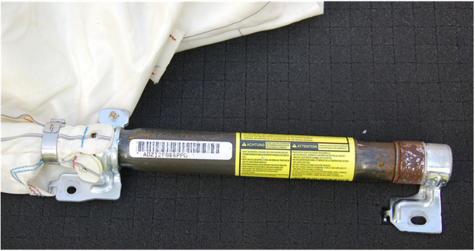 Compressed gas cylinder for curtain shield airbag