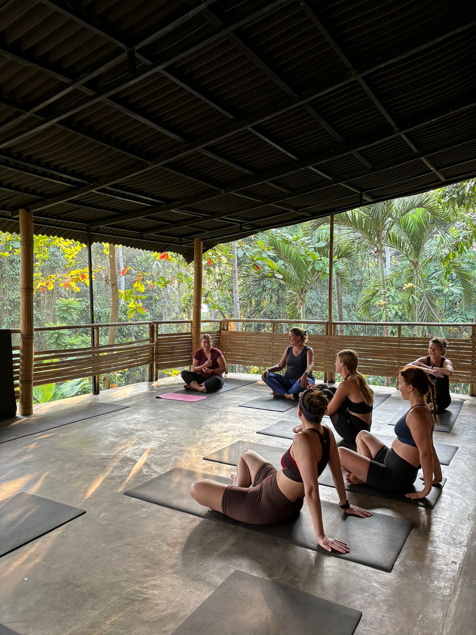 retreat participants waiting for yoga class at the yogashala