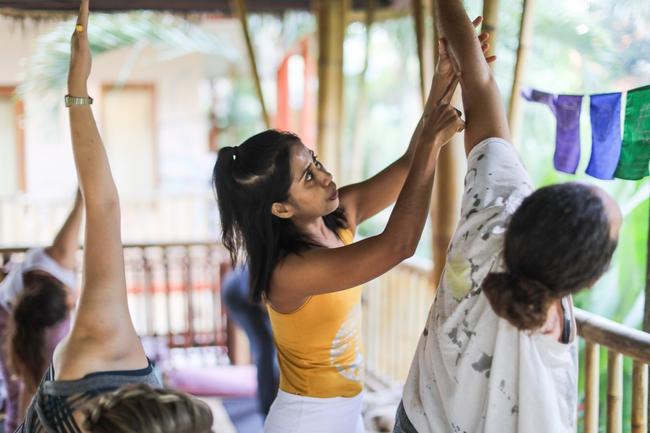 Certified yoga teacher, teaching at a yoga retreat in shanti toya ashram
