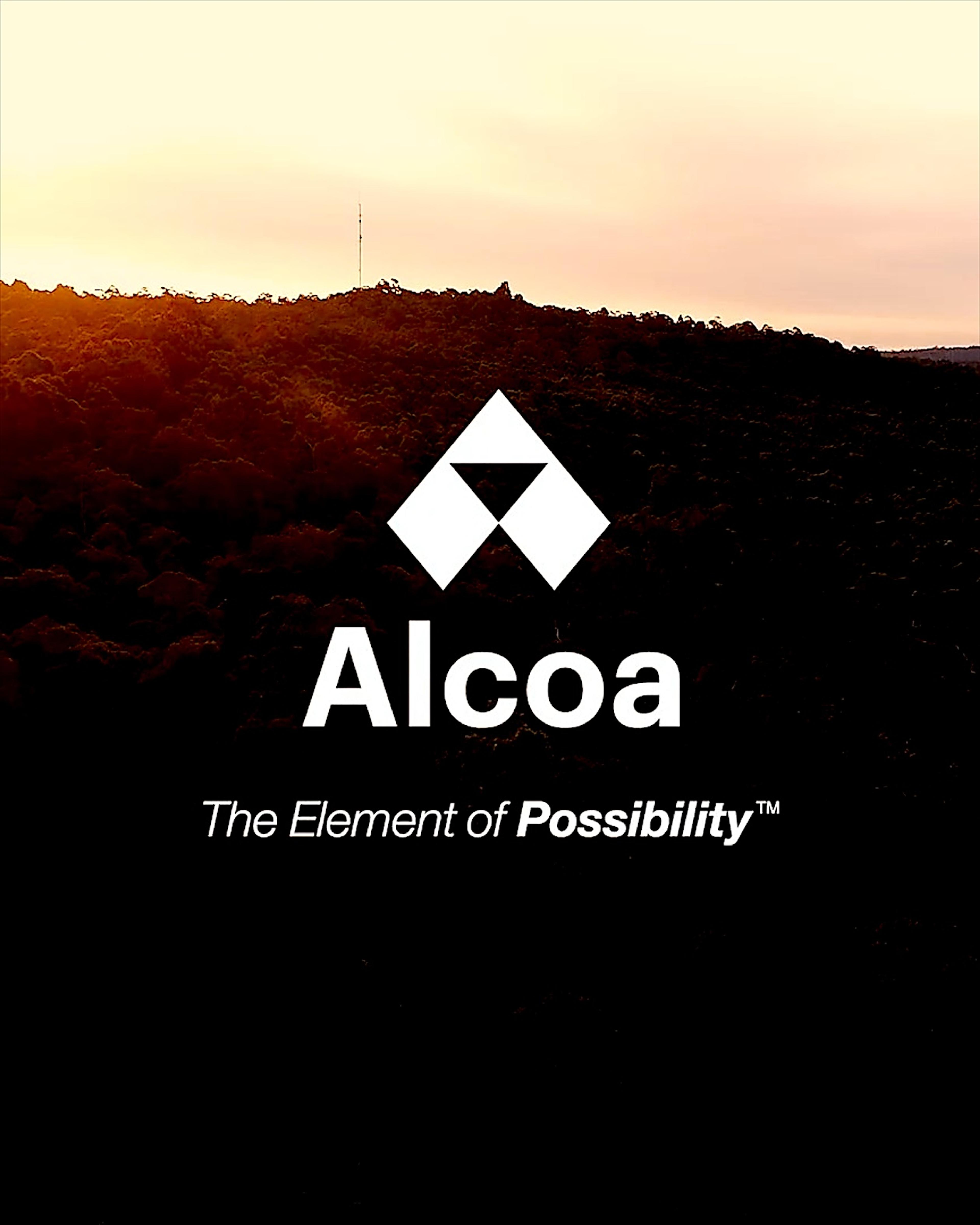 The Alcoa logo over the jarrah forest at sunset