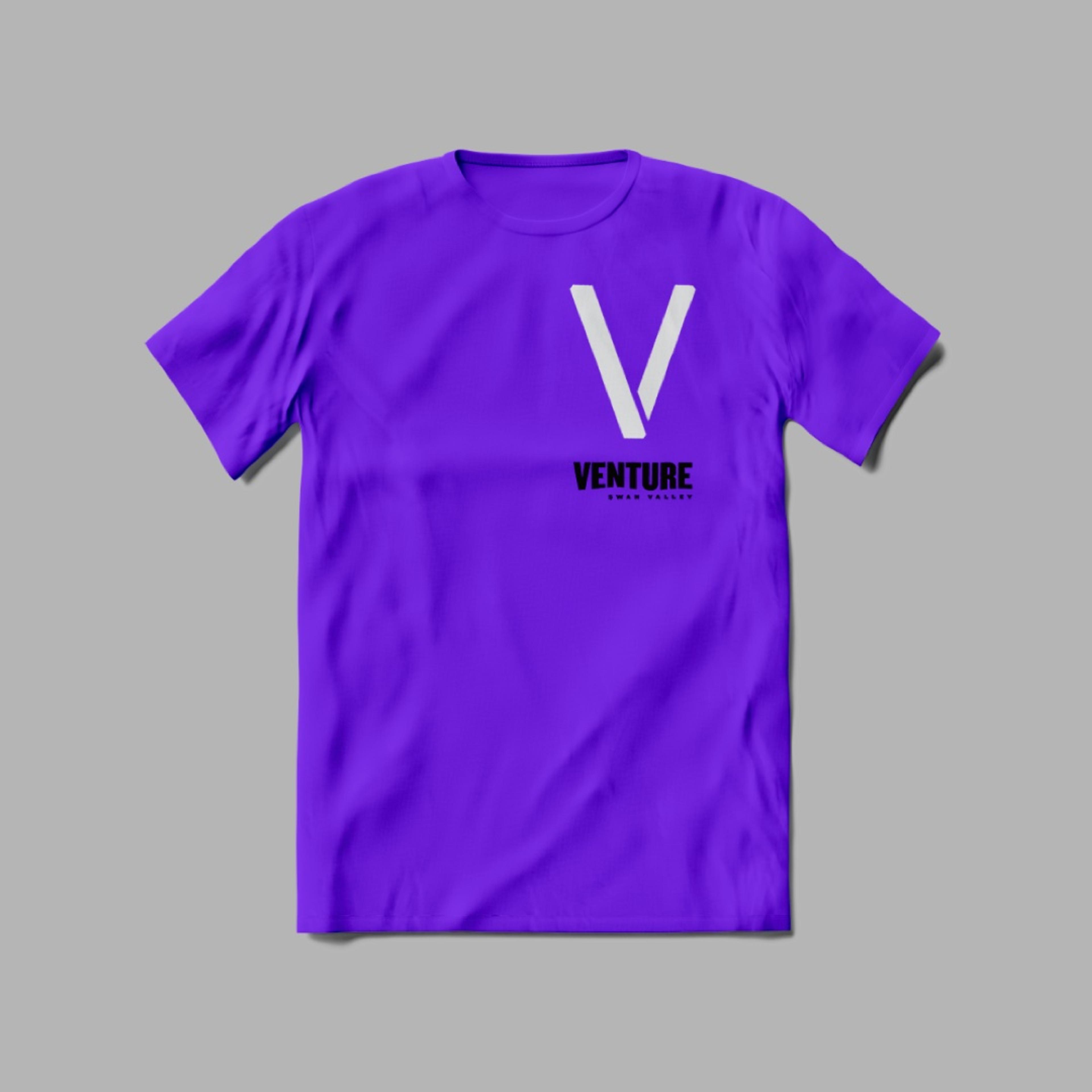 A purple Venture tee with the white V and VENTURE Swan Valley logotype