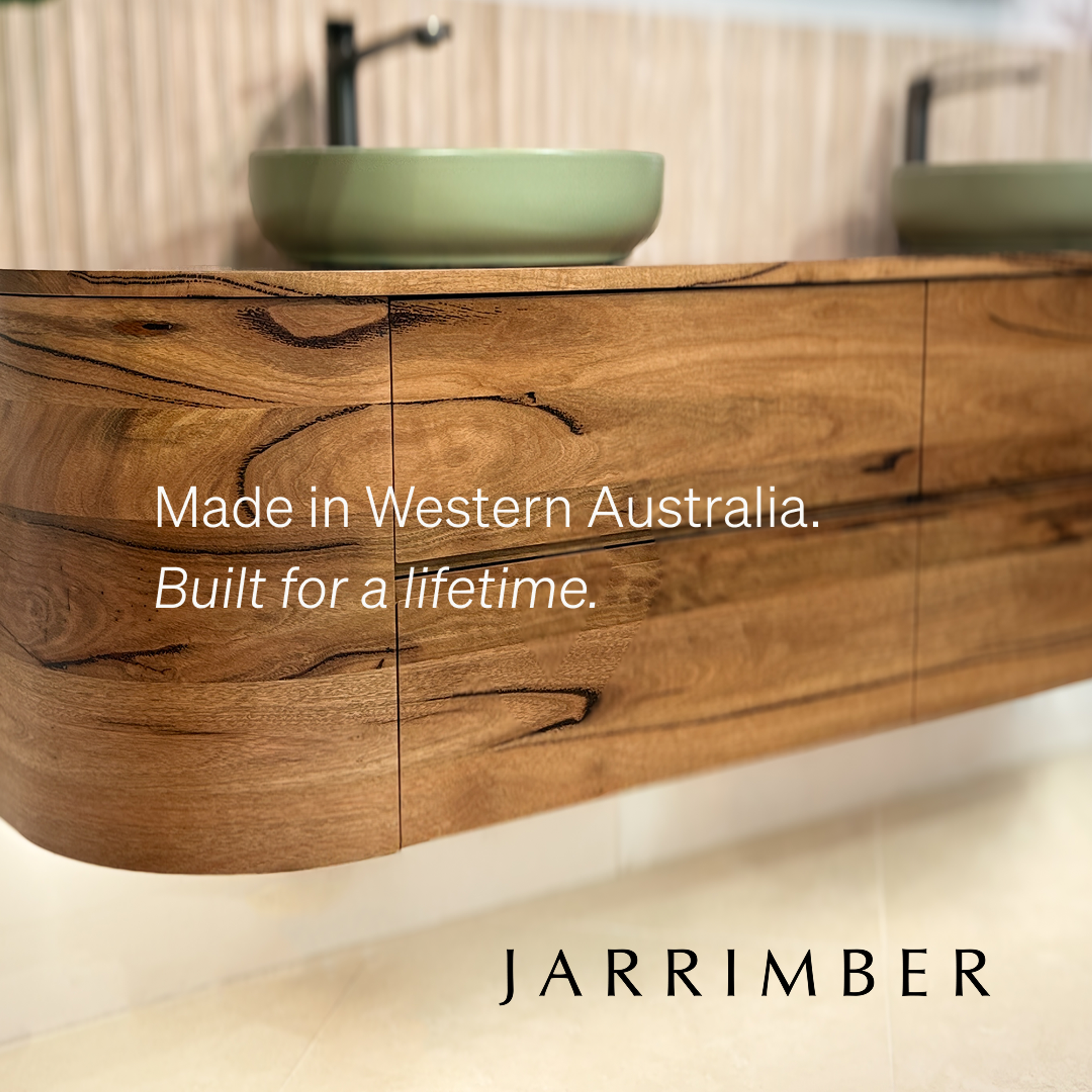 Ad reading “Made in Western Australia. Built for a lifetime.” over a curved Marri bathroom vanity