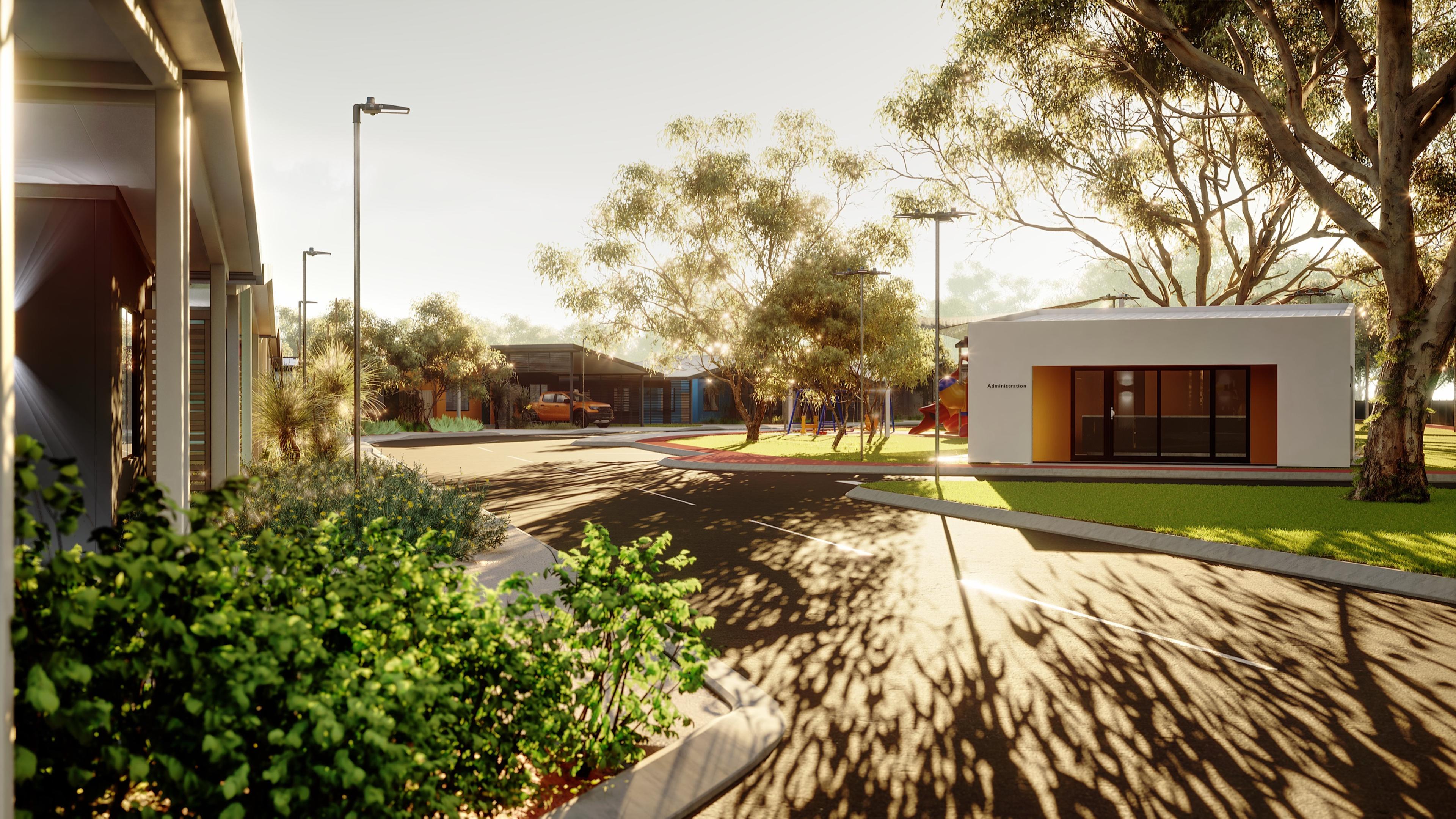 Main street with the administration building and park under gum trees