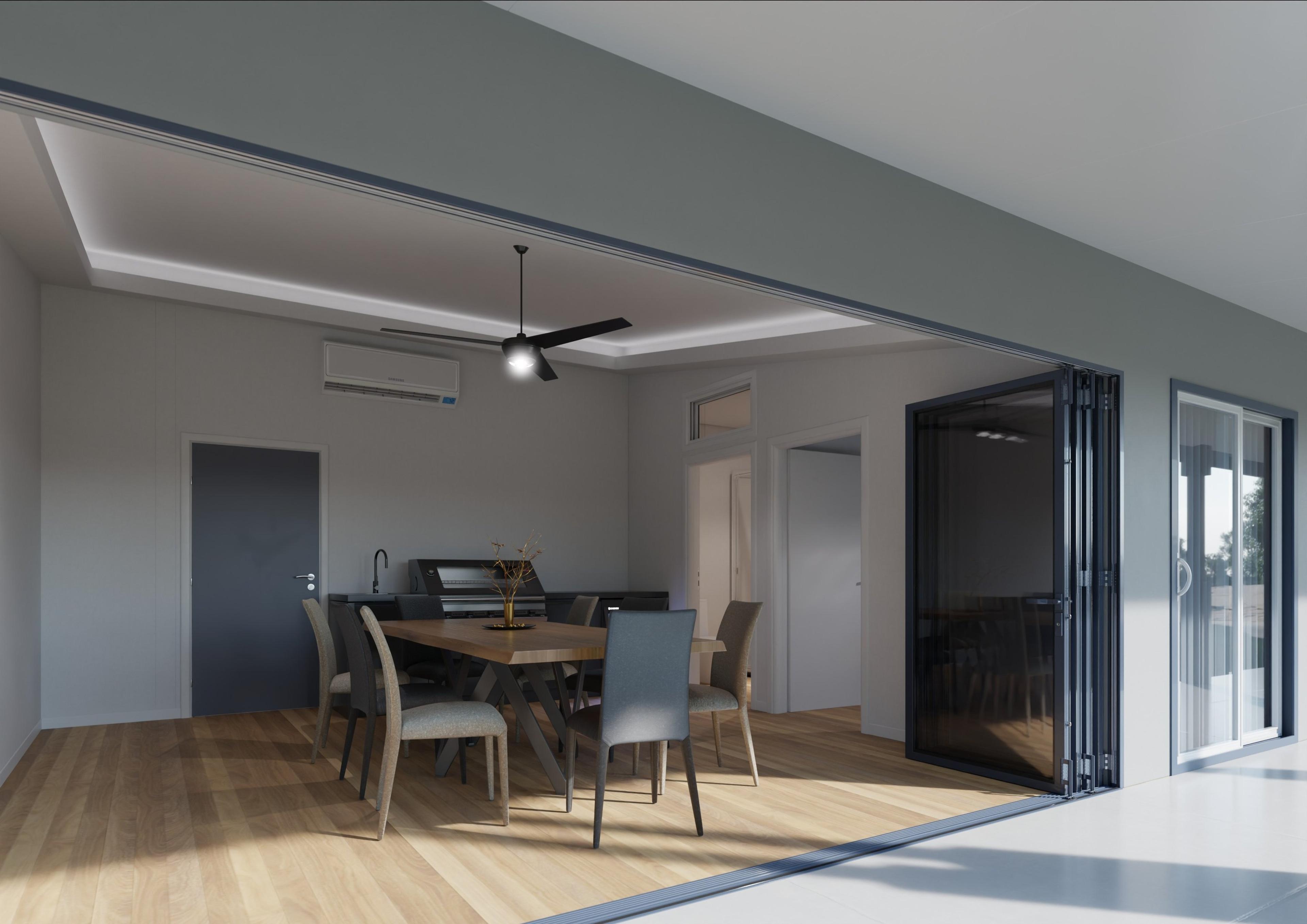 Dining area opening onto the verandah through bifold doors