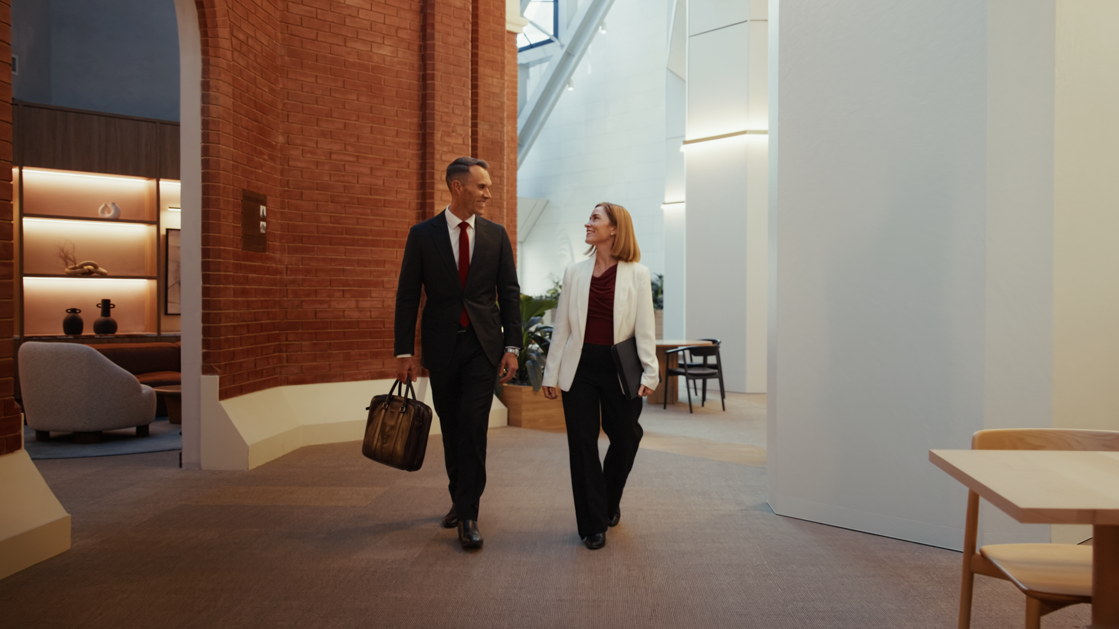 The Crabtree Legal team walking through their building’s atrium