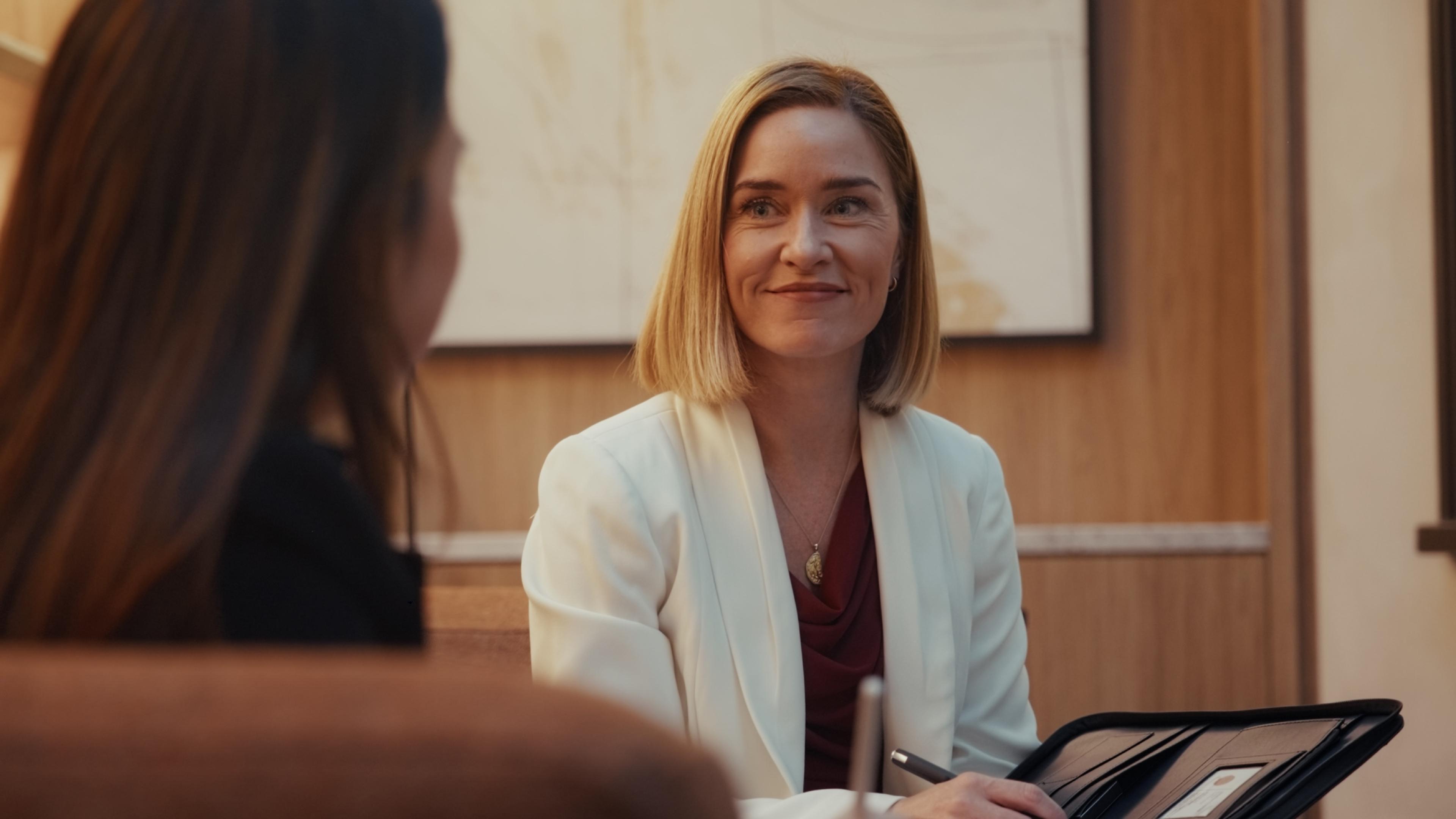 A Crabtree Legal lawyer smiling with a client