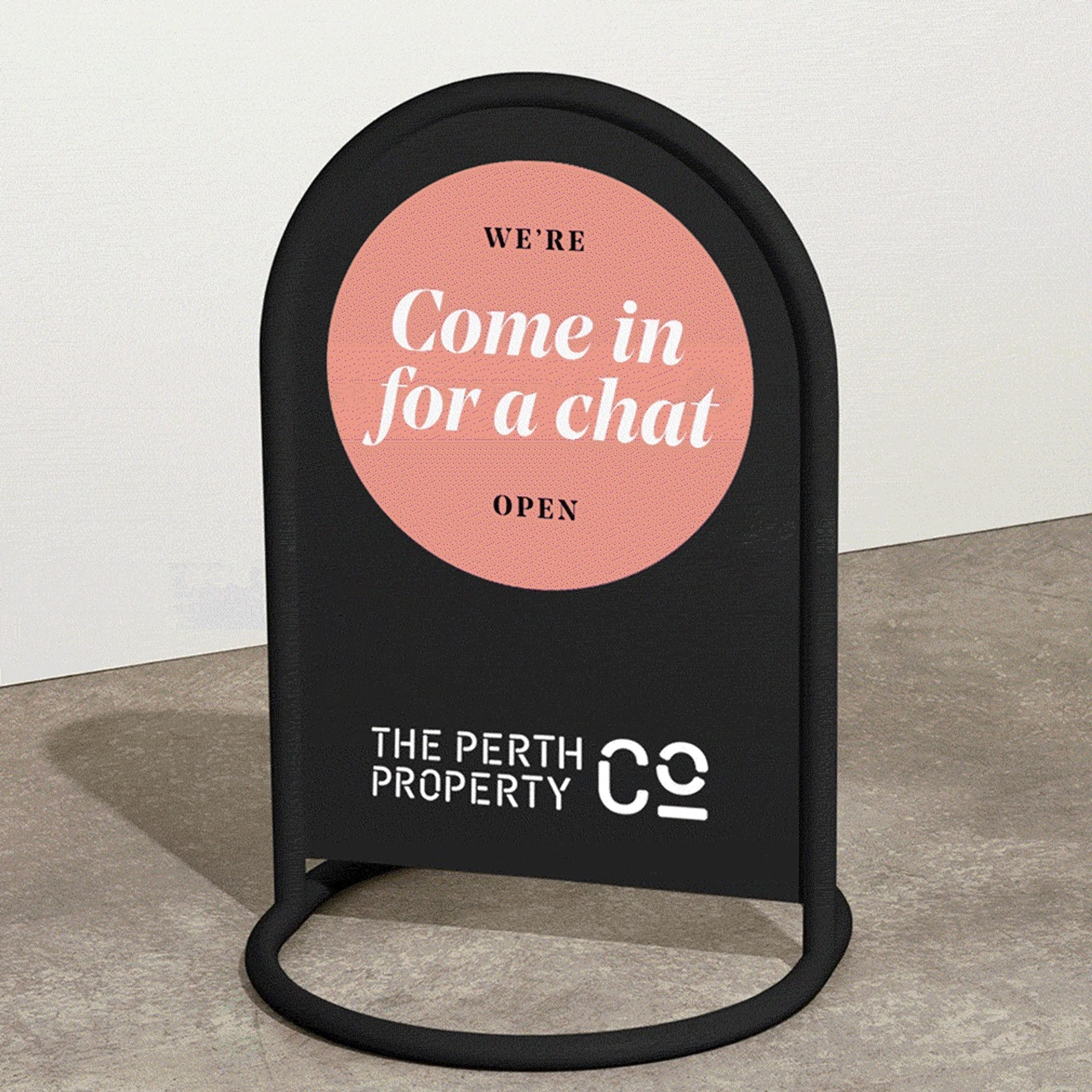 A-frame sign reading “Come in for a chat”