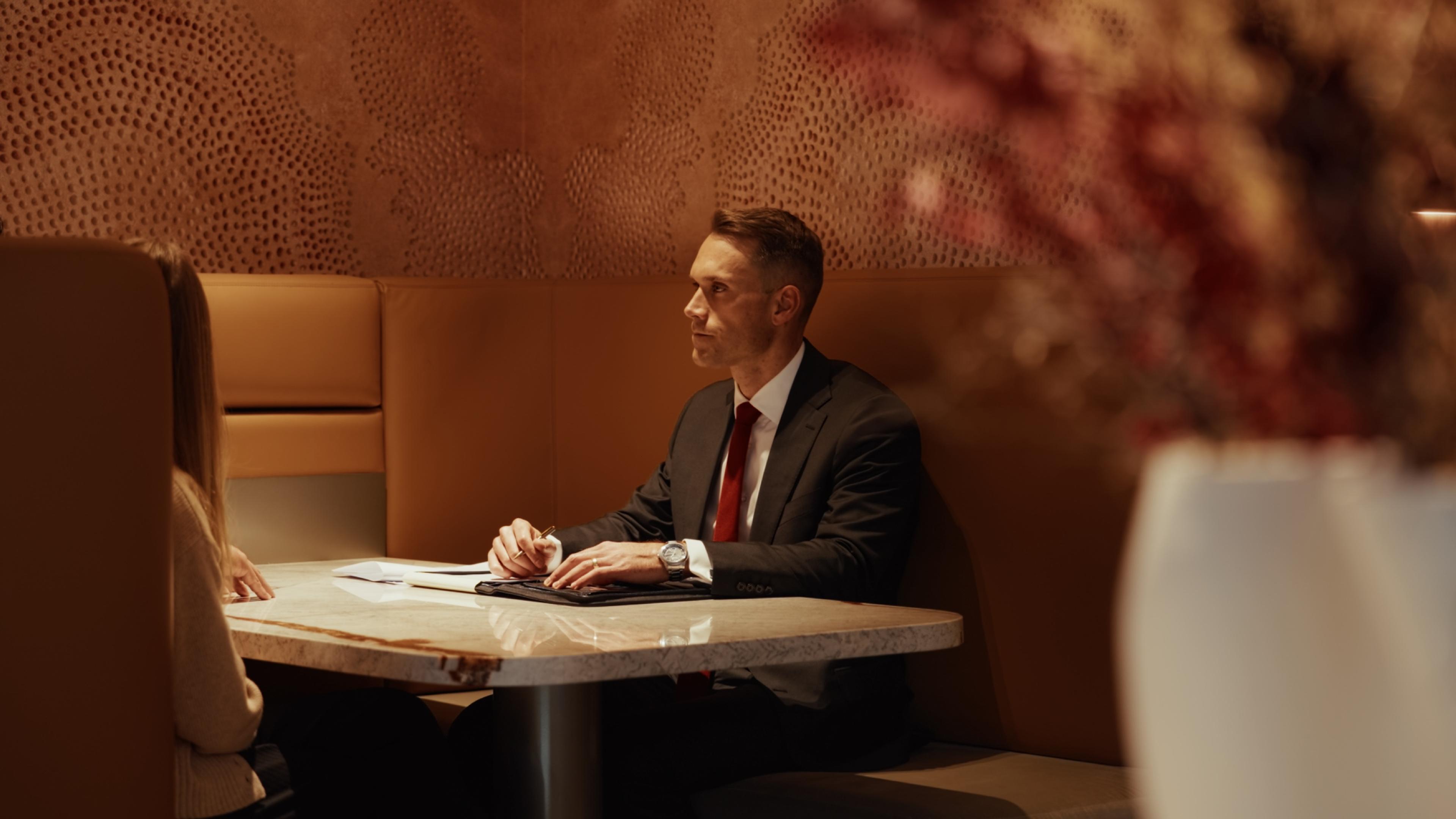 Jonathan at a meeting table
